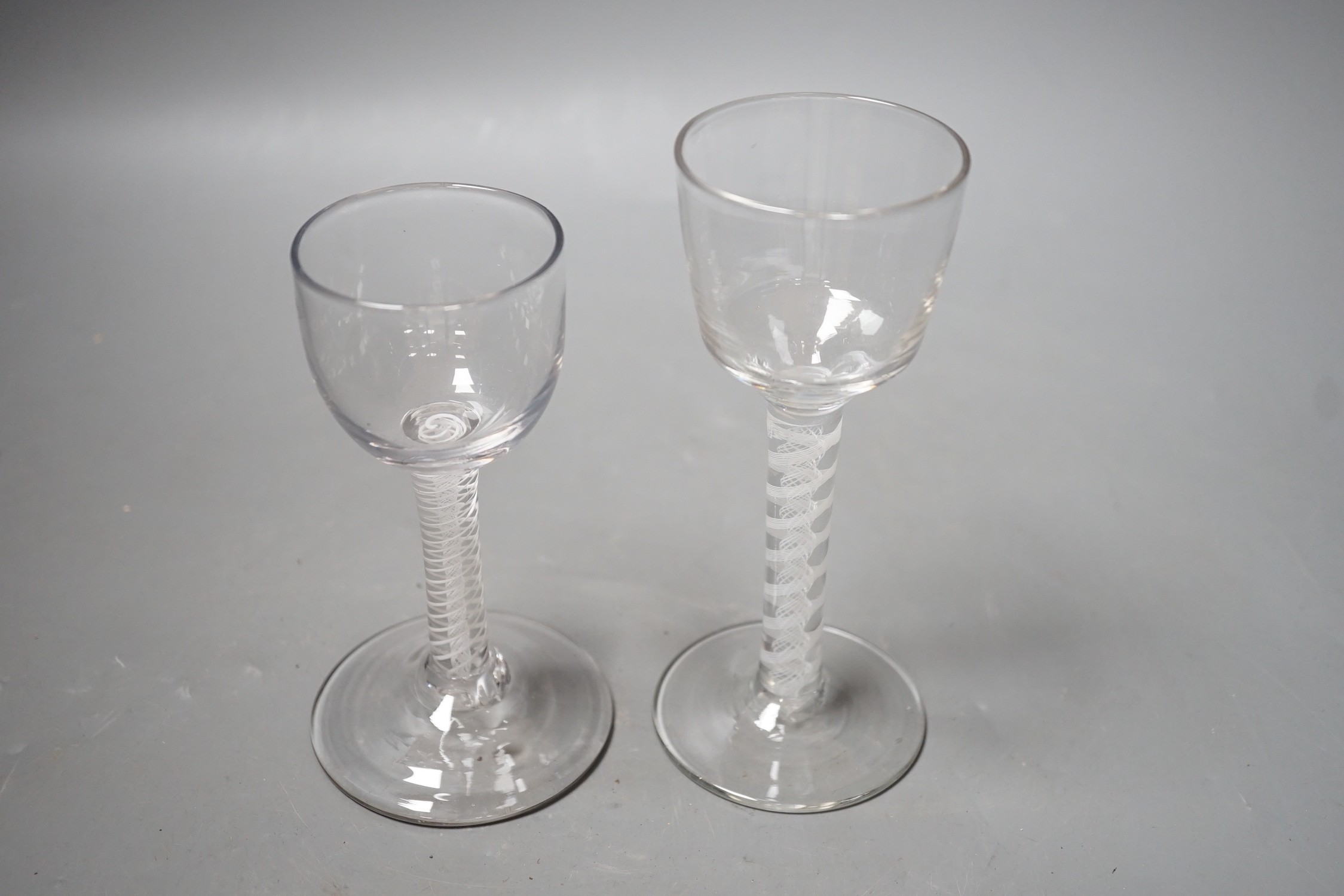 Two 18th century DSOT stem wine glasses, tallest 15cm